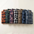 The Derrick Sherpa-Lined Plaid Shirt Jacket folded in all seven plaids
